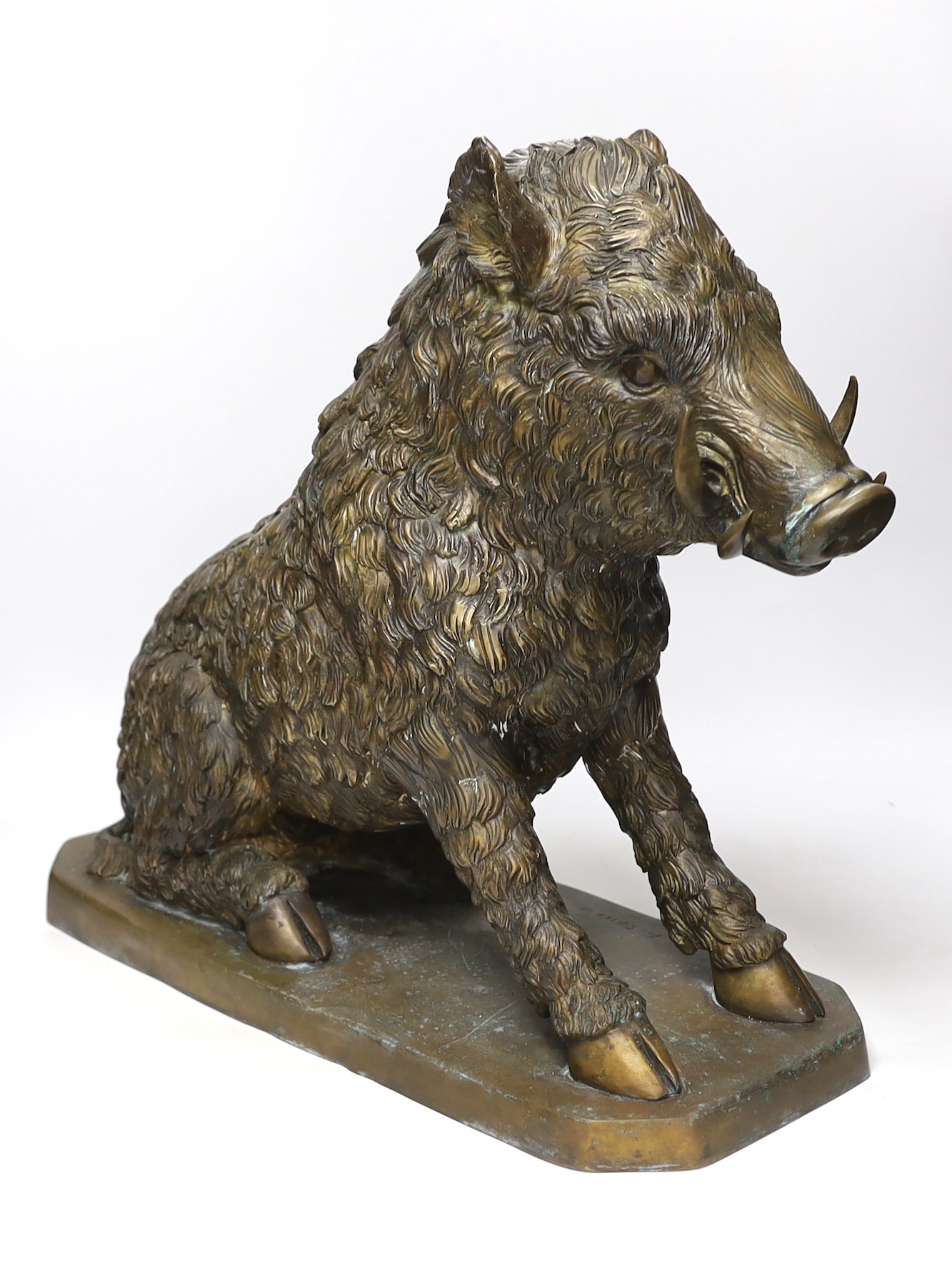 A large bronze model of a boar after Antonio Canova, 46cm high